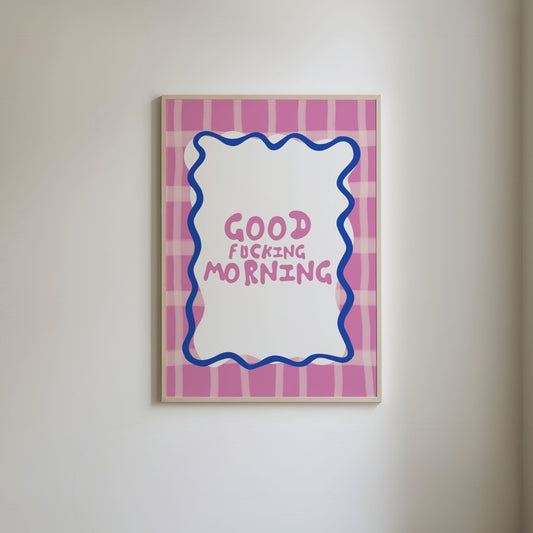 Art print with a pink and white grid-patterned border, featuring a squiggly blue outline and bold pink text that reads 'Good fucking morning.