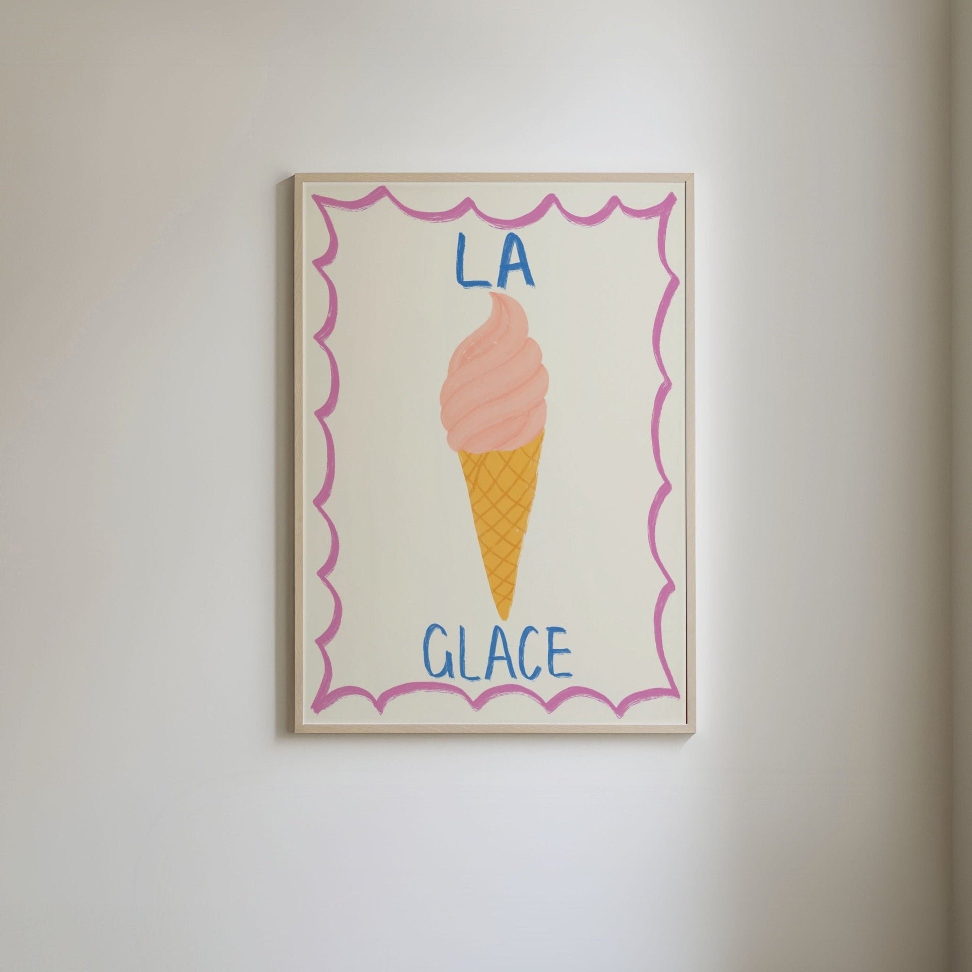 Art print featuring a hand-drawn ice cream illustration with blue handwritten text 'la glace,' framed by a bold, bright pink border.