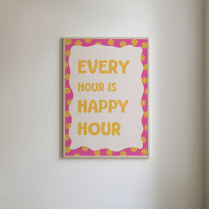 Art print with a pink border featuring a yellow smiley face pattern, and bold yellow text 'Every hour is happy hour.