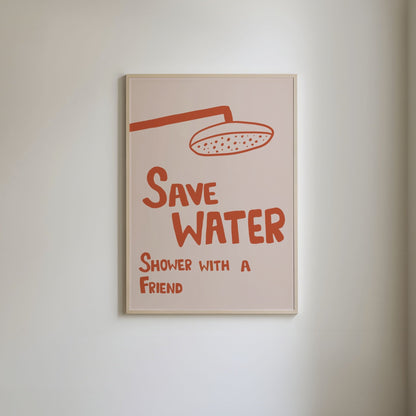 Messy-style art print with handwritten text 'Save water, shower with a friend' in orange, featuring a sketched orange showerhead illustration.